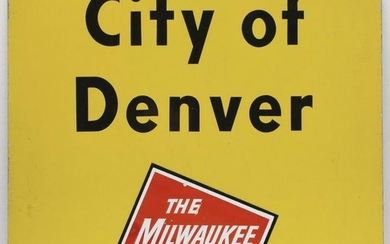 A GATE SIGN FOR THE CITY OF DENVER ON MILWAUKEE ROAD