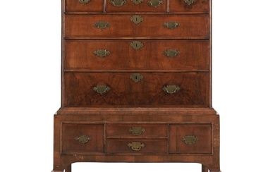 A GEORGE I FIGURED WALNUT CHEST-ON-STAND 1720s