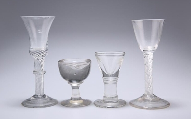 A GROUP OF FOUR ANTIQUE DRINKING GLASSES, comprising
