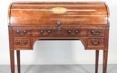 A George III mahogany cylinder desk, with satinwood inlay and...