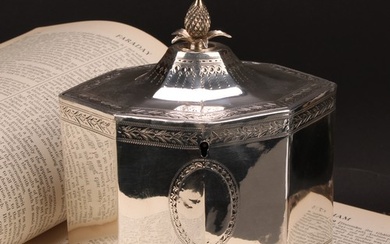 A George III silver octagonal tea caddy, flush-hinged cover ...