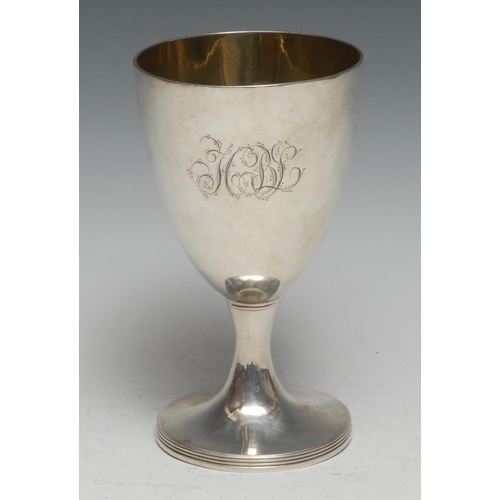 A George III silver pedestal goblet, hemi-ovoid bowl, domed ...