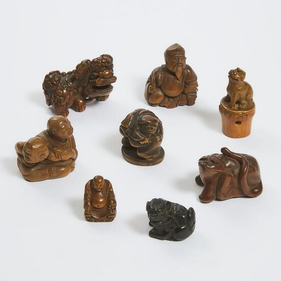 A Group of Eight Boxwood and Bamboo Netsuke and