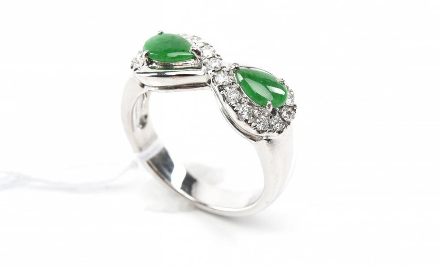 A JADE AND DIAMOND RING WITH TYPE A JADE CERTIFICATION IN 18CT WHITE GOLD