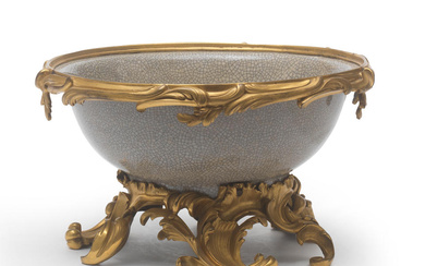 A LARGE CRACKLE-GLAZED ORMOLU-MOUNTED BOWL The porcelain Chinese, 18th century,...