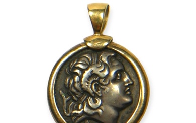 A LATE 19TH/EARLY 20TH CENTURY FRENCH 14CT GOLD PENDANT HOUS...