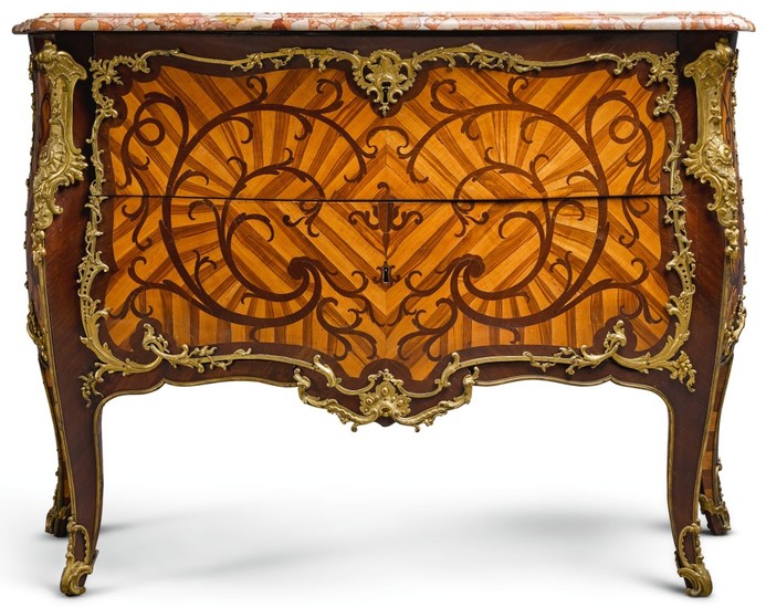 A LOUIS XV GILT-BRONZE-MOUNTED TULIPWOOD, AMARANTH AND BOIS SATINÉ MARQUETRY BOMBÉ COMMODE BY ADRIEN DELORME MID-18TH CENTURY