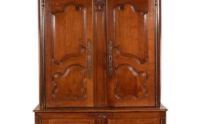 A Louis XV Provincial Cherry Stepback Cupboard