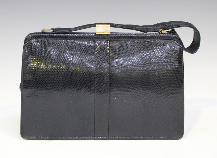 A Mappin & Webb black leather handbag, width 28cm, boxed.