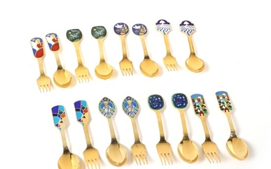 A. Michelsen: Eight sets of christmas cutlery comprising forks and spoons og gilded sterling silver with enamel decoration. (16)