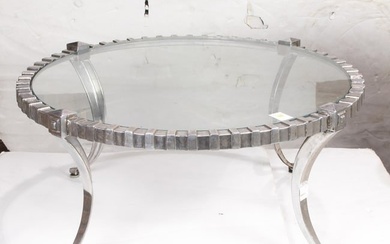 A Modern aluminum and glass coffee table in the style of Arthur Court