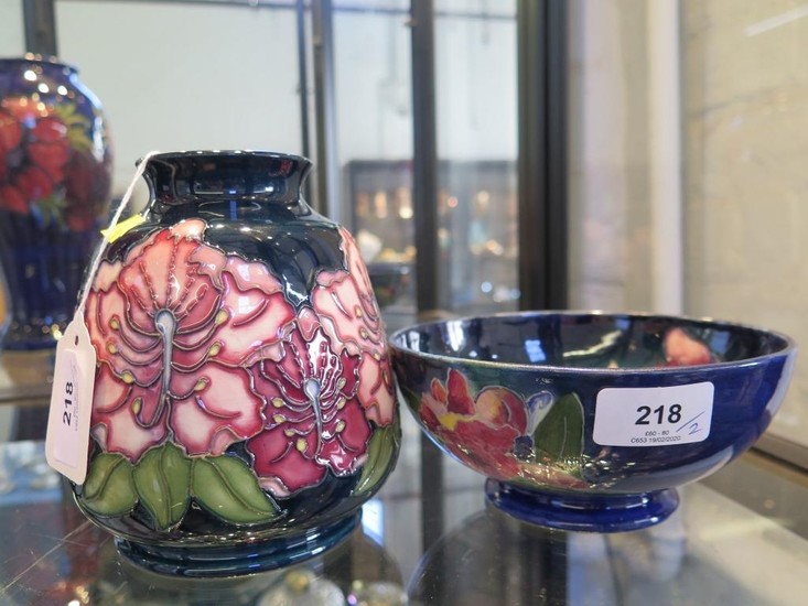 A Moorcroft Pottery pink orchid design tapering vase, dated ...