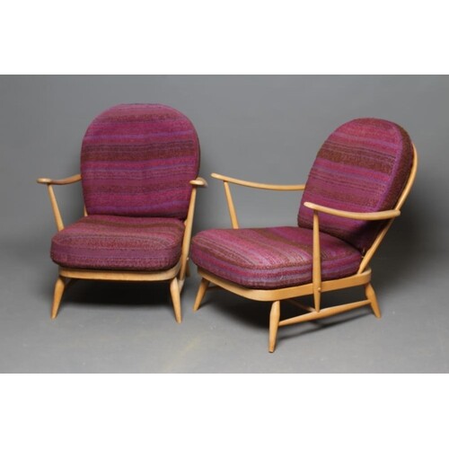 A PAIR OF ERCOL BEECH AND ELM ARMCHAIRS, model 203, with arc...