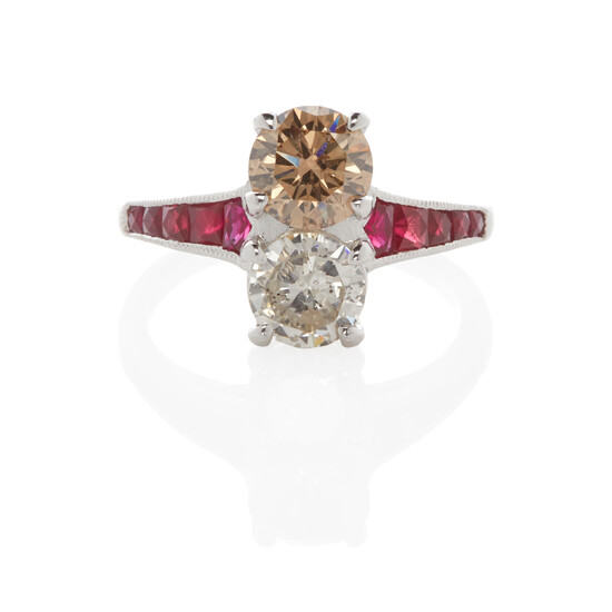 A PLATINUM TWO-STONE FANCY COLORED DIAMOND AND DIAMOND RING