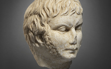 A ROMAN MARBLE HEAD OF A MAN, EASTERN EMPIRE, CIRCA 2ND CENTURY A.D.