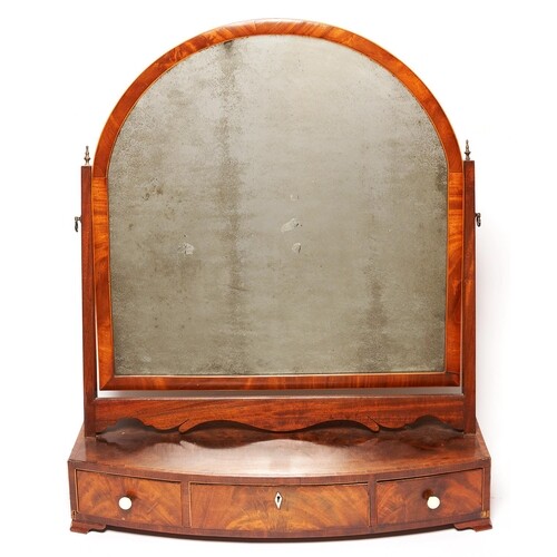 A Regency mahogany dressing table mirror, c1820, the arched ...