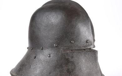 A SALLET, formed in one piece, with raised metal ridge.