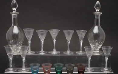 A SET OF EIGHT AIR TWIST GLASSES, A PAIR OF 1950S CUT GLASS DECANTERS, AND A HARLEQUIN SET OF FIVE COLOURED AIR TWIST GLASSES.