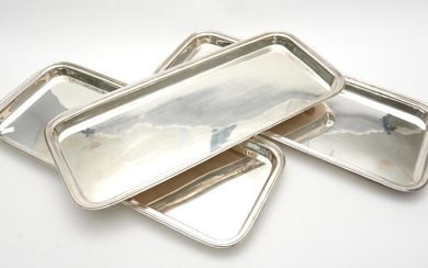 A SET OF THREE LARGE RALPH LAUREN SILVER PLATED TRAYS, 53.5 CM LONG, 22.5 CM WIDE EACH