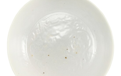 A SHUFU WHITE-GLAZED 'FLORAL' DISH YUAN DYNASTY | 元 樞府卵白釉花卉紋盤