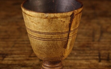 A Small 18th Century Turned Horn Whisky Toddy, on a ring turned stem and foot, 3'' (7.5 cm) in heigh