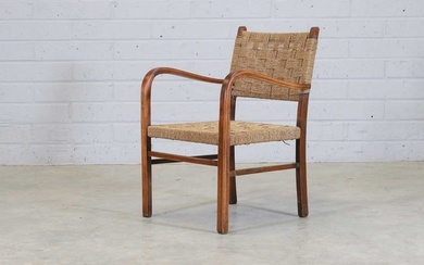 A Swedish stained beech bentwood armchair