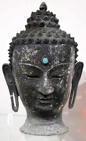 A TIBETAN BRONZED BUDDHA HEAD