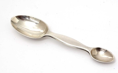 A Victorian silver medicine spoon.