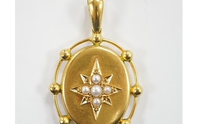 A Victorian yellow metal and split pearl set oval pendant, t...