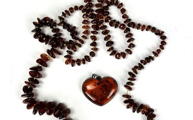 A Vintage Necklaces Cherry Amber Necklace with Heart Pendant