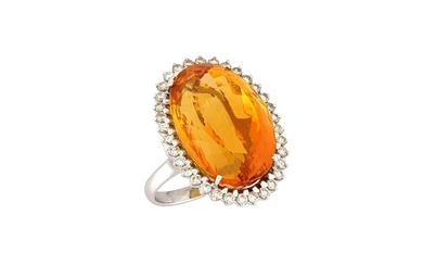 A citrine and diamond cluster ring