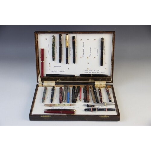A collection of ballpoint and fountain pens, to include a bo...
