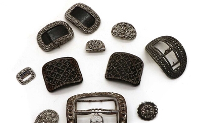 A collection of eleven steel buckles and clasps