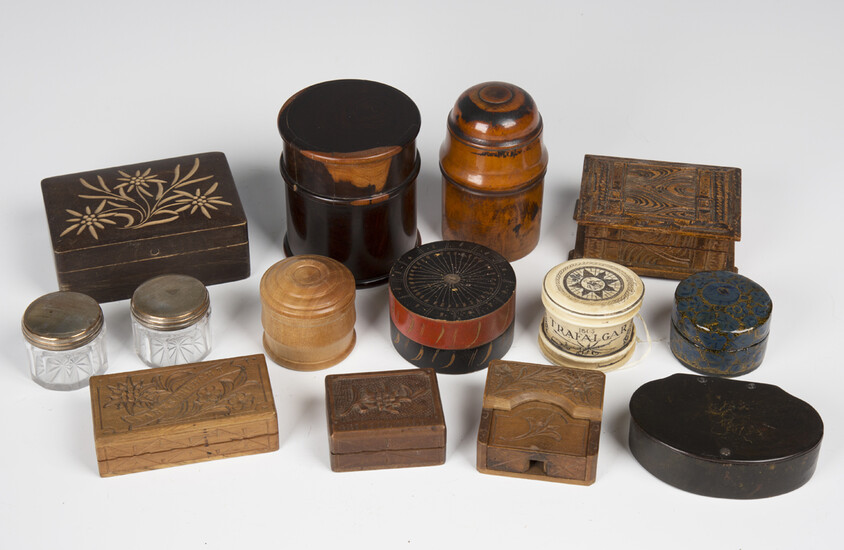 A collection of various boxes, including papier-mâché snuff boxes, turned treen vessel cas