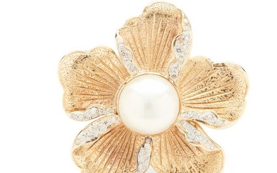 A cultured mabe pearl and diamond flower brooch