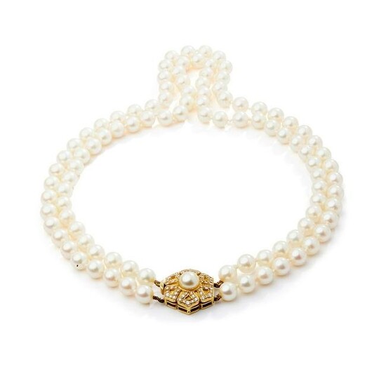 A cultured pearl and diamond necklace, by Leo De
