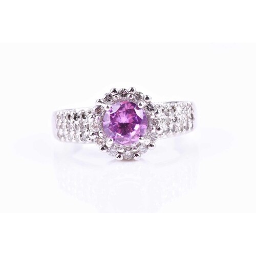 A diamond and pink topaz cocktail ring, set with a round-cut...