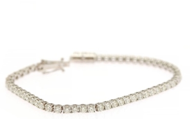 A diamond bracelet set with numerous brilliant-cut diamonds totalling app. 6.50 ct., mounted in 18k white gold. L. 17.9 cm.