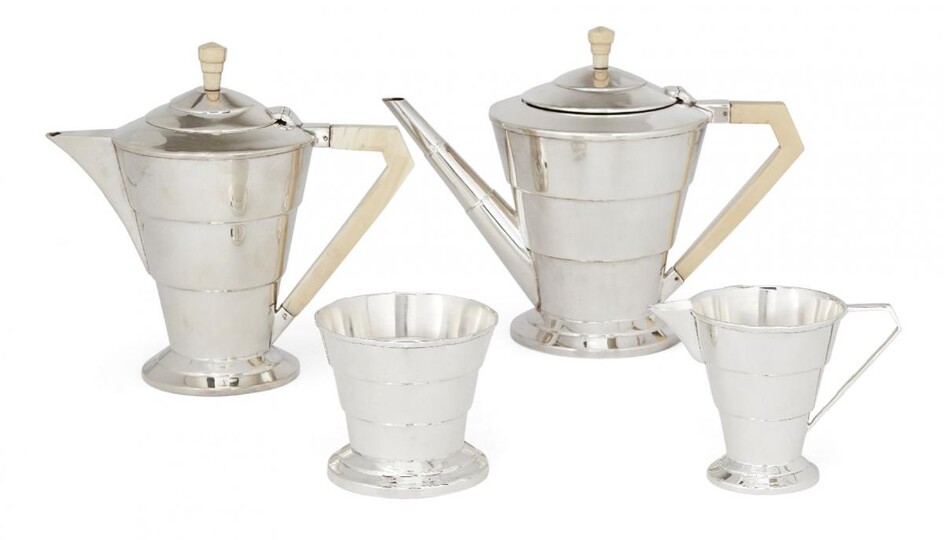 Amendment: Please note that this is a matched set and the hallmarks are as follows: teapot and milk jug London, c.1935, EV; sugar London, c.1934, EV; hot water pot Sheffield, c.1937, EV. A four-piece Art Deco silver tea service by Viners Ltd...