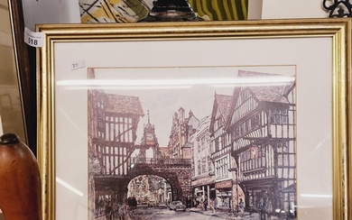 A framed print of Eastgate Street Chester.
