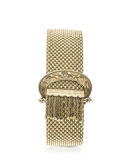 A gold mesh bracelet with buckle clasp