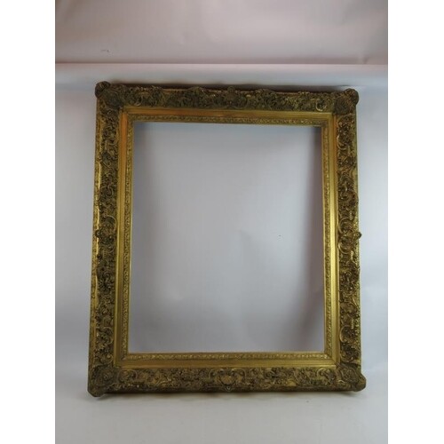 A good 19th century gill gesso picture frame, the swept rect...