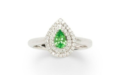 A green garnet, diamond and eighteen karat white gold