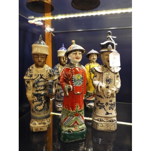 A group of five Chinese porcelain figures, four having seal ...