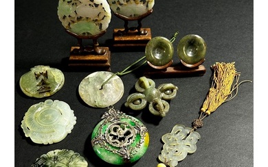 A group of nine Chinese carved jadeite / bowenite jade / har...