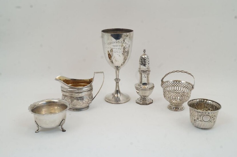 A group of silver, including: a George III cream jug, London, 1804, rubbed makers marks, with engraved floral bands and repousse scrolling foliate decoration, 11cm high; a sugar caster, Chester, 1908, possibly John Round & Son Ltd, with octagonal...
