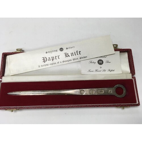 A hallmarked silver meat skewer paper knife by Francis Howar...