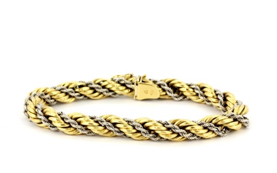 A heavy 18ct yellow and white gold twist bracelet, L. 20.5cm.