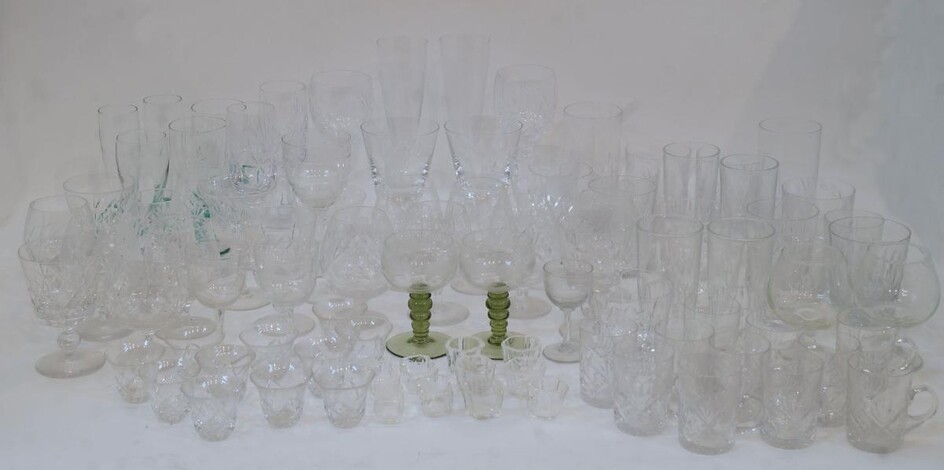 A large quantity of glassware, to include: a pair of decanters, wine coasters, drinking glasses, two cake stands, a vase and various dishes (A LOT) (VAT charged on hammer price)