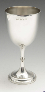 A late Victorian plain silver goblet.